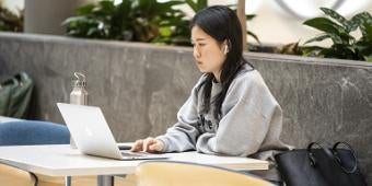 Student working on a laptop