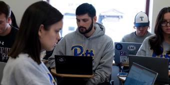 Students working on laptops